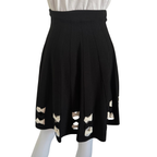 Alexander McQueen, Strickrock