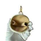Louis Vuitton Mini Wallet und Taschenschmuck, rose/beige