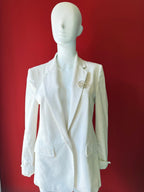 Chanel Brosche, CC